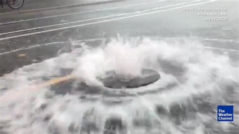 Heavy Rains Lift Manhole Cover in Minneapolis, Minnesota | The Weather ...