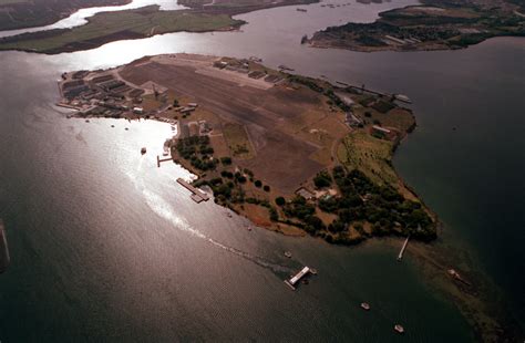 File:An aerial view of Ford Island and the USS ARIZONA Memorial (lower center). Exact date shot ...