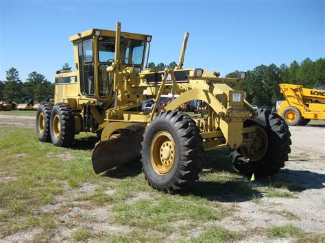 CAT 140H MOTOR GRADER - J.M. Wood Auction Company, Inc.