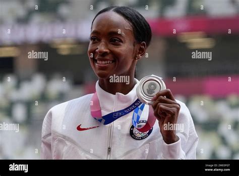 Silver medalist Dalilah Muhammad, of the United States, poses during ...