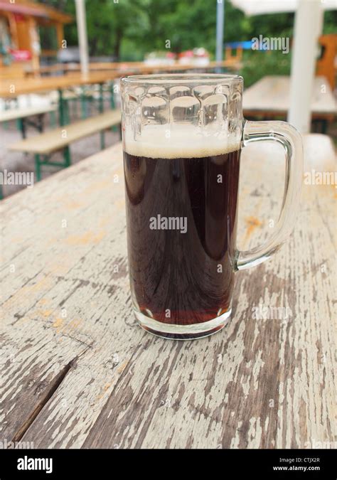 A glass of German dark beer Stock Photo - Alamy