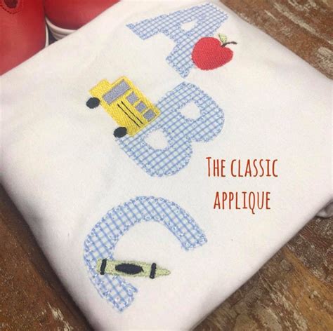 Back to school ABC blanket stitch applique with apple, bus, and crayon ...