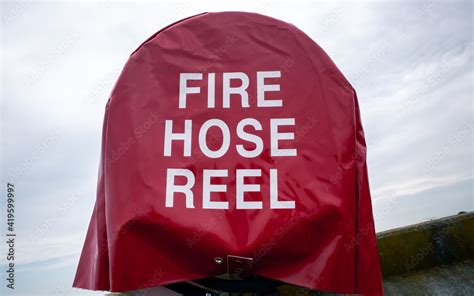 Fire hose reel sign Stock Photo | Adobe Stock