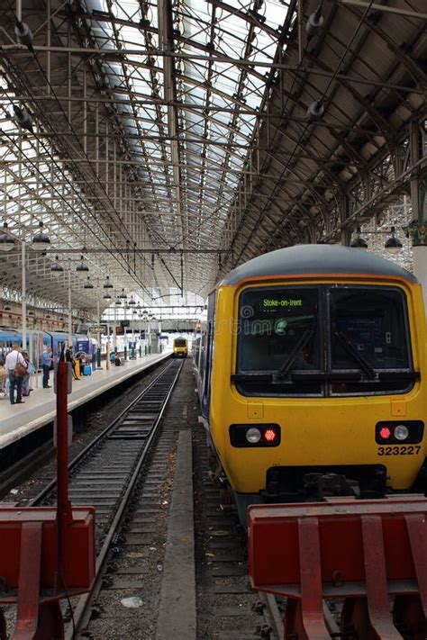 Train Waiting On The Piccadilly Station In Manchester Editorial Photography - Image of rail ...