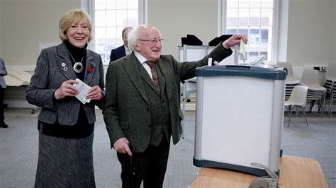 President Michael D Higgins votes in referendums