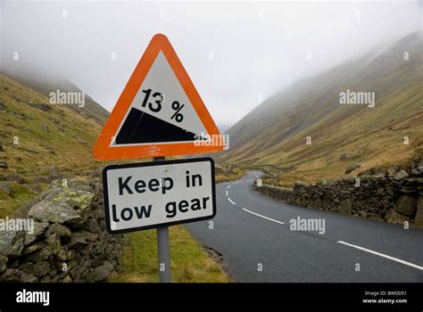 Steep hill road warning sign hi-res stock photography and images - Alamy