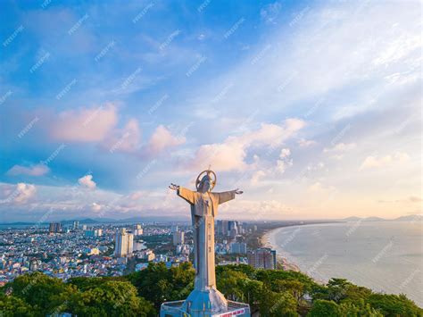 Premium Photo | Top view of Vung Tau with statue of Jesus Christ on ...