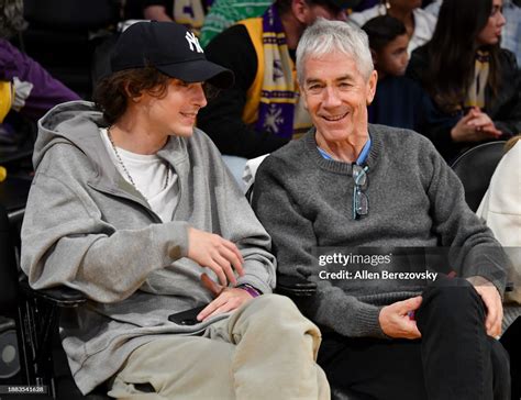 Timothee Chalamet and his father Marc Chalamet attend a basketball ...