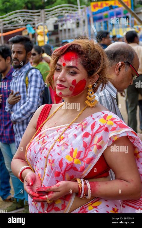 Women participate in Sindur Khela at a puja pandal on the last day of Durga puja at Baghbazar ...