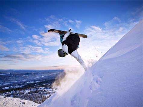 Extreme sport winter snowboarding blue sky Preview | 10wallpaper.com