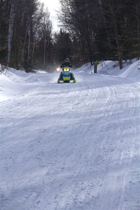 Snowmobilers Ride on a Trail on Bald Mountain, Rangeley, Maine ...