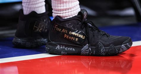 Kyrie Irving Sends New Message With Old Shoes - Sports Illustrated ...