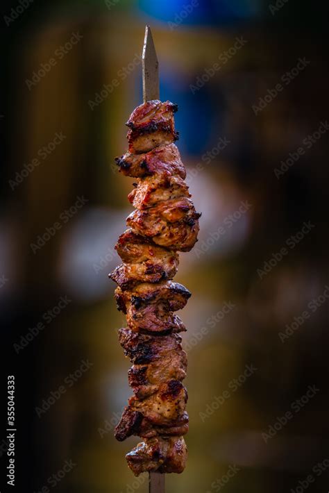 Porc brochette cooked on the barbecue Stock Photo | Adobe Stock