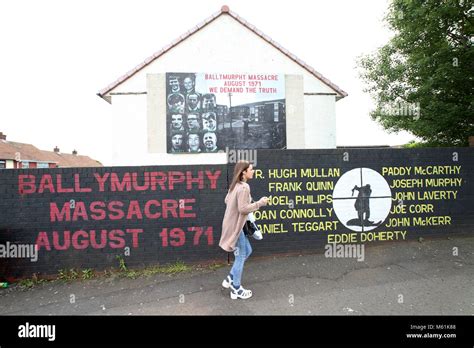 Murals dedicated to the 1971 Ballymurphy Massacre seen on a wall in ...