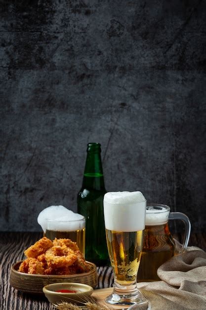 Free Photo | Beer with crispy fish hors d'oeuvres, World Beer Day.