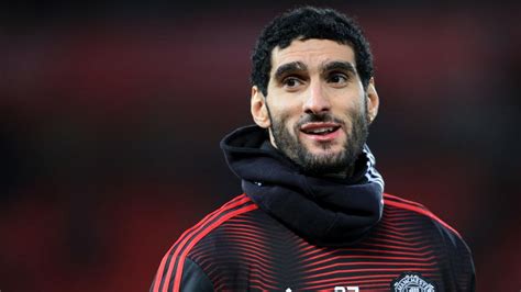 Marouane Fellaini completes move to Shandong Luneng Taishan after six years at Manchester United ...