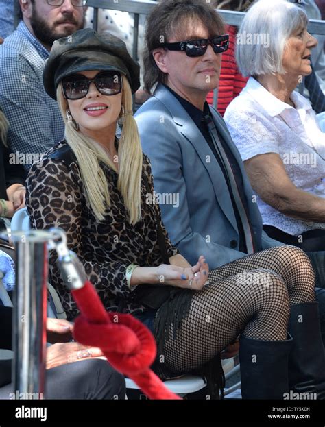 Singers Orianthi (L) and Richie Sambora attend an unveiling ceremony ...