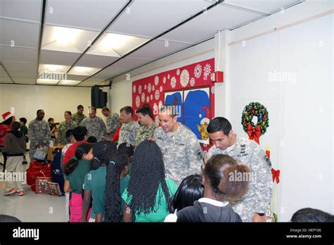 Service members assigned to Special Operations Command South greet ...