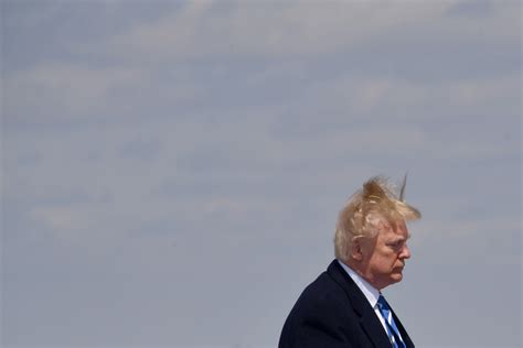 PHOTOS: The Wind Got The Best Of POTUS On His Way To West Virginia | The Daily Caller