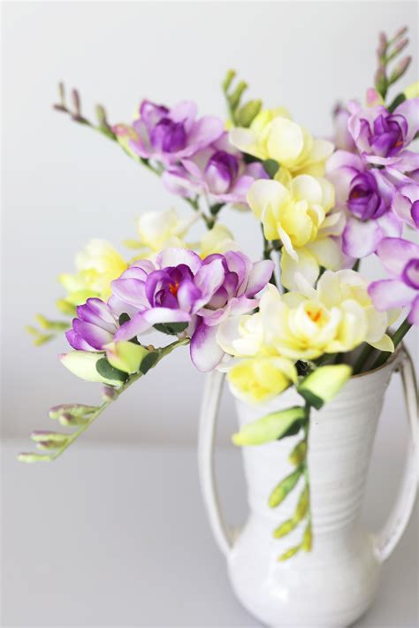 Simple Yellow and Purple Freesia Spring Flower Arrangement | Spring flower arrangements ...