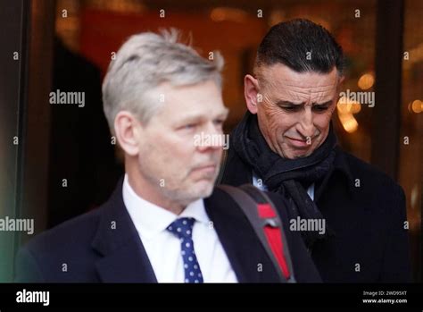 Fujitsu's European boss Paul Patterson (right) leaves Aldwych House ...