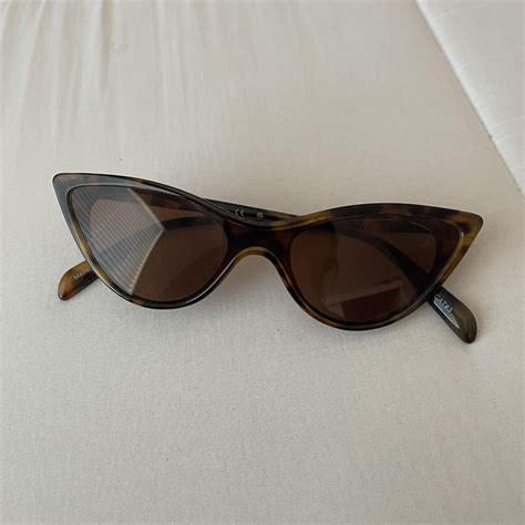 tortoise shell cat eye shaped sunglasses! brown tint... - Depop