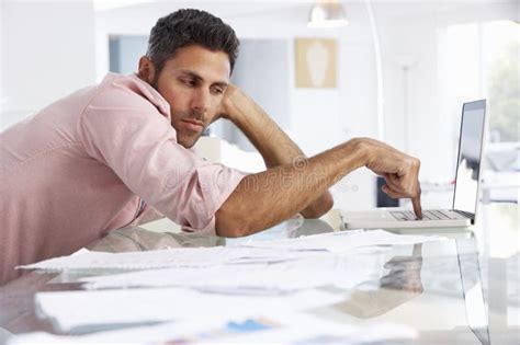 Stressed Man Working at Desk in Busy Creative Office Stock Image - Image of headache, head: 29484649