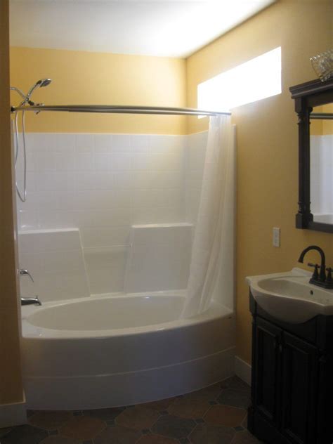 Oval White Acrylic Tub Shower Combo Using White Curtain In Yellow Painted Bathroom Wall ...