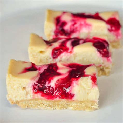 Raspberry Swirl Cheesecake Bars. ONLY 135 CALORIES EACH!