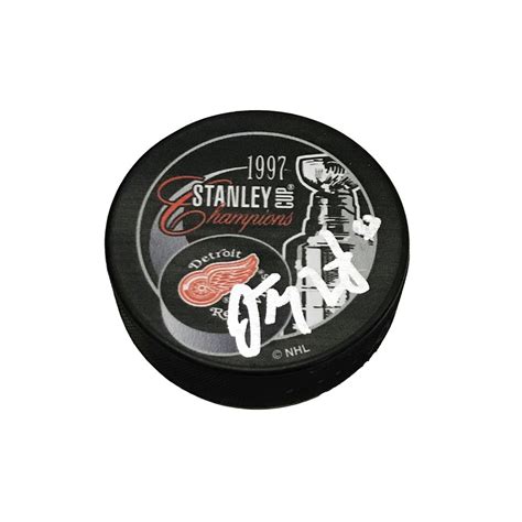 DARREN MCCARTY Signed 1997 Stanley Cup Champions Puck - Detroit Red Wings - NHL Auctions