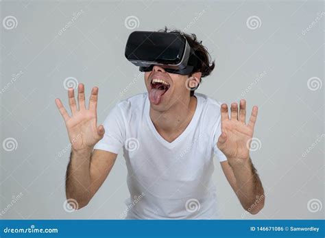 Portrait of Cheerful and Shocked Young Man Wearing Virtual Reality ...