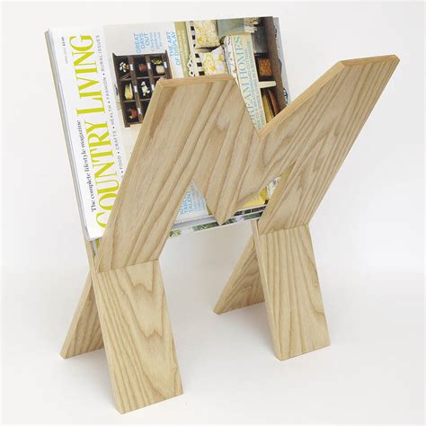 wooden magazine rack by cairn wood design | notonthehighstreet.com