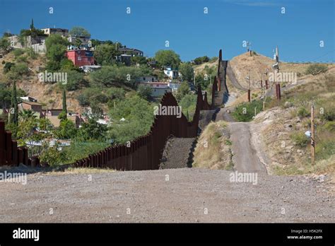 Nogales, Arizona - The U.S.-Mexico border fence. Mexico is on the left ...