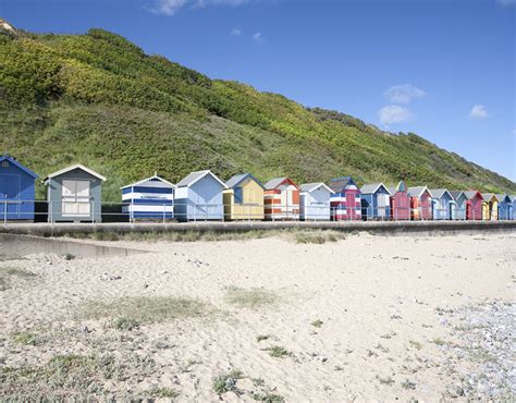 Colorful beach huts by the seaside in Cromer | Inside Cromer: The idyllic seaside town on ...