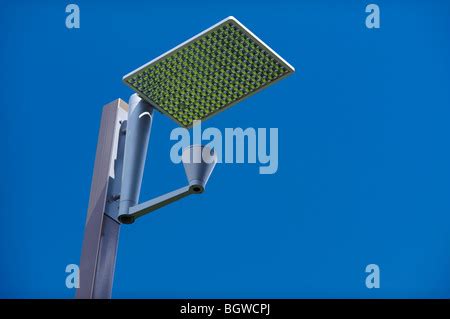 Modern street lighting pole with solar panel Stock Photo - Alamy