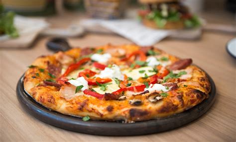 $19 for a 13-inch Pizza + Two Juices - The Shed Cafe - Hurstville | Groupon