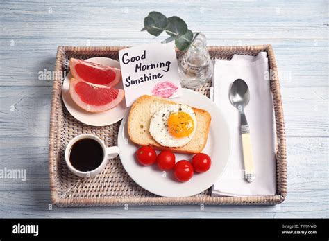 Delicious breakfast and GOOD MORNING greeting note on wooden table, top view Stock Photo - Alamy