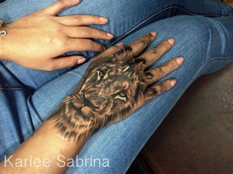 Stunning Lion Hand Tattoo | Best tattoo design ideas