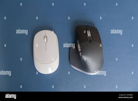 Comparison of Ergonomic vertical mouse and general mouse on desk at ...