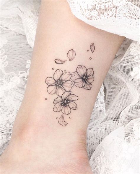 Flower Petals Falling Off Flower Tattoo