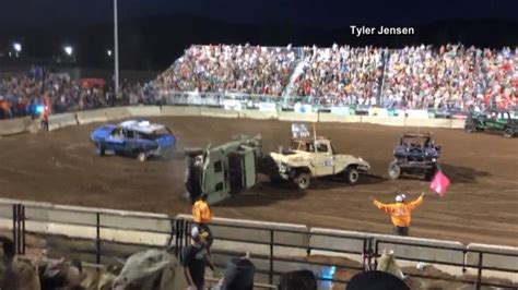 Demolition Derby Crash Sends Debris Flying Into Crowd - NBC News