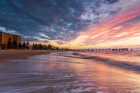 Glenelg Beach Beach Foreshore With Pier And People At Sunset Stock ...