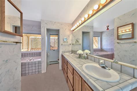 Master bathroom with jetted tub & stall shower - Lake Tahoe Real Estate - SouthTahoeHomeSearch.com