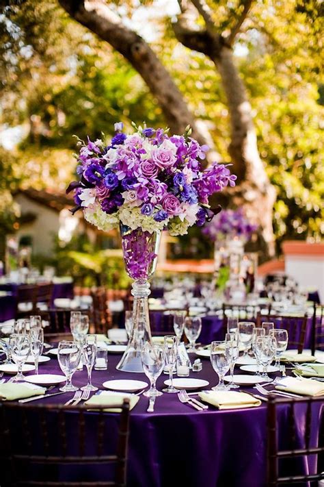 Outdoor wedding reception table decor with purple flowers and tablecloth Purple Reception ...