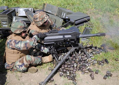 Seabee fires MK-19 grenade launcher during training. - a photo on ...