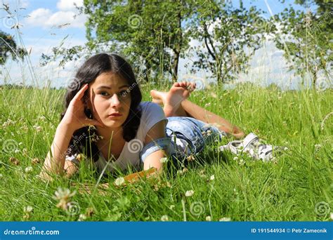 Barefoot Woman Laying Grass