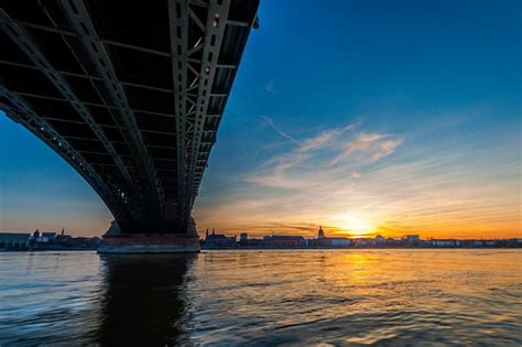 Premium Photo | Beautiful sunset over rhine / rhein river and old bridge in mainz near frankfurt ...