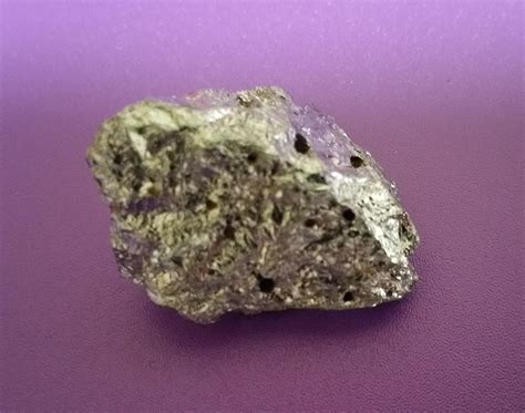 Small Silver Metallic Rock Very Light and Shiny : r/whatsthisrock