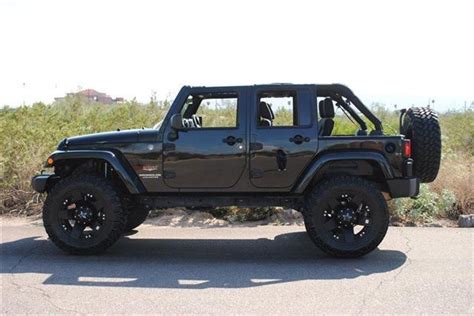 Black Jeep Wrangler Rubicon 4 Door - Margaret Mills