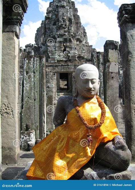 Buddha at Angkor Wat stock photo. Image of temple, orange - 3161894